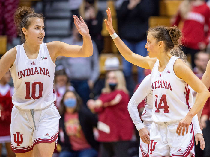 Indiana's Aleksa Gulbe and guard Ali Patberg high five
